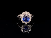 3.03ct Oval Royal Blue Sapphire & 0.55ct Diamond 18ct White Gold Cluster Ring
