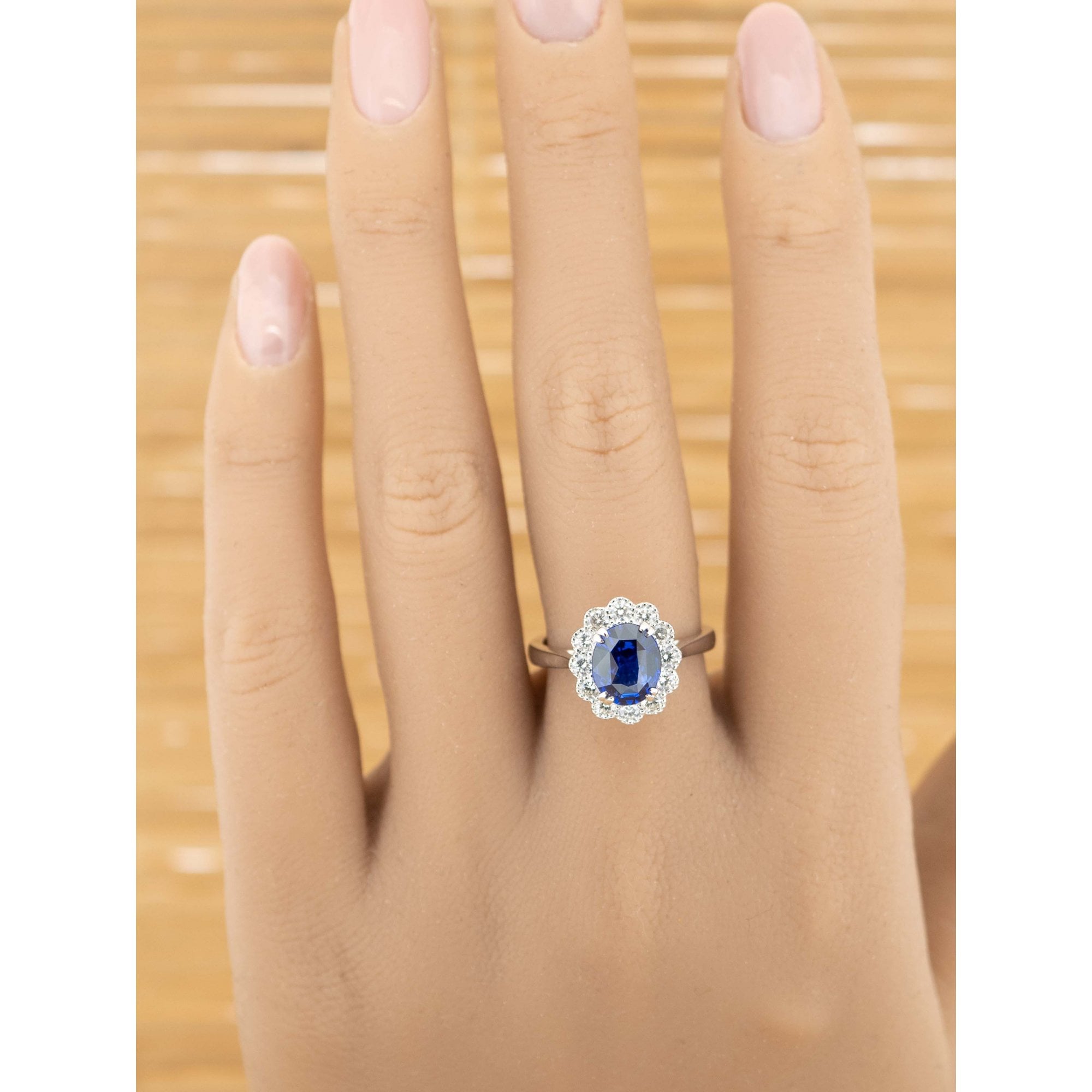 3.03ct Oval Royal Blue Sapphire & 0.55ct Diamond 18ct White Gold Cluster Ring