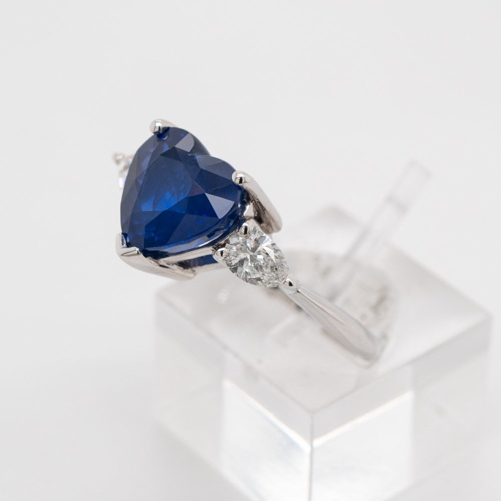 18ct White Gold 4.63ct Sapphire and 0.47ct Pear Cut Diamond Ring