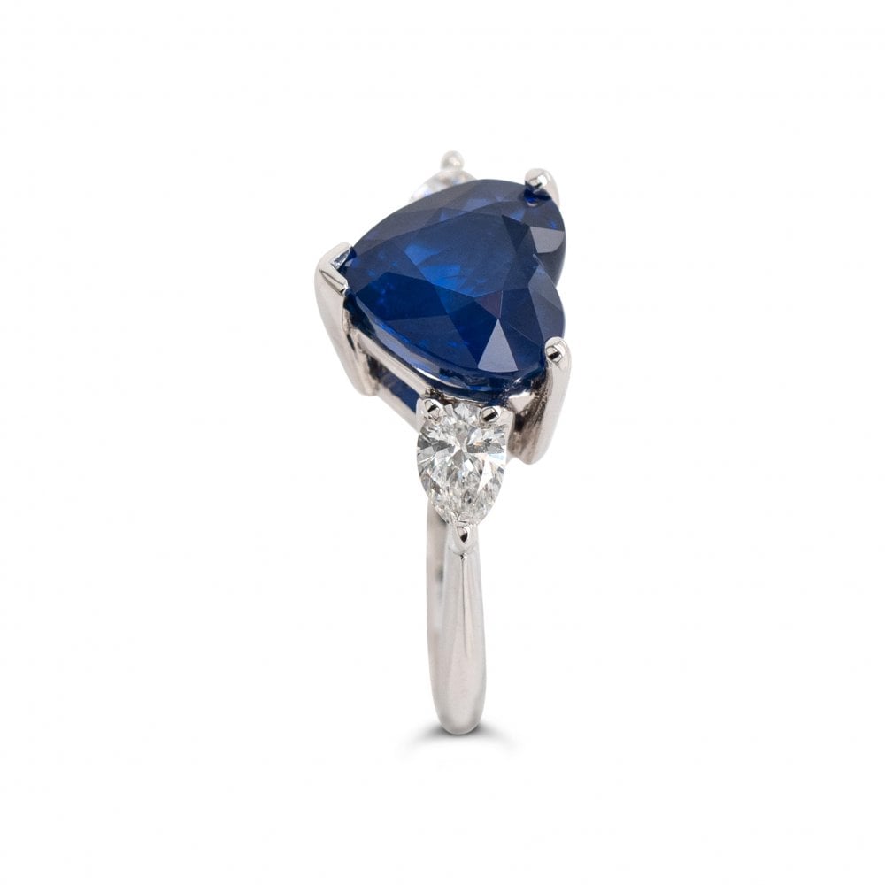 18ct White Gold 4.63ct Sapphire and 0.47ct Pear Cut Diamond Ring