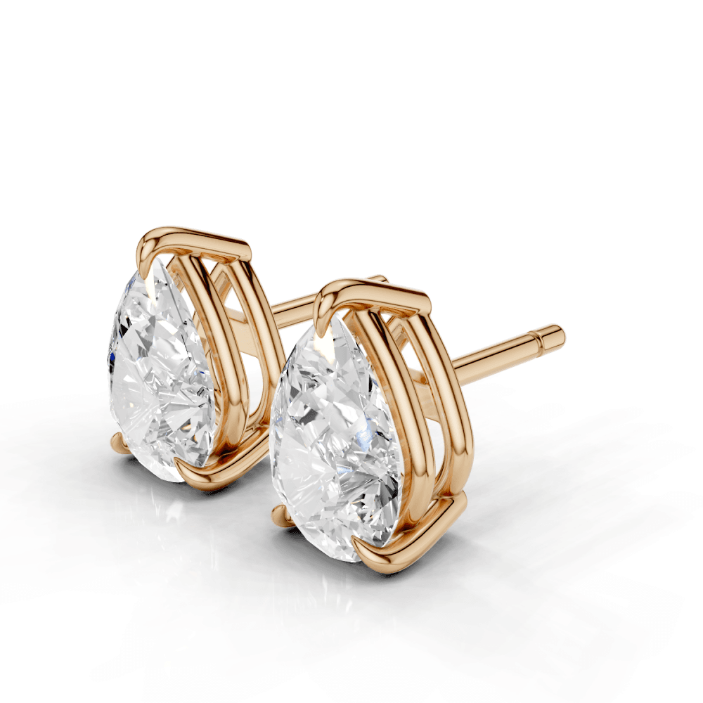 Pear Cut Diamond 4 Claw Stud Earrings