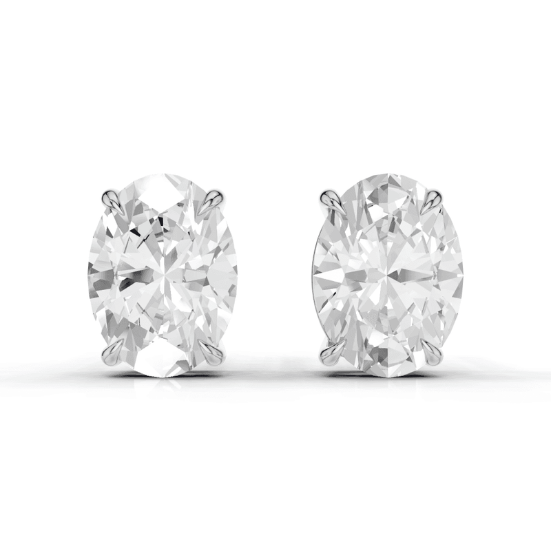 Oval Cut Diamond 4 Claw Stud Earrings