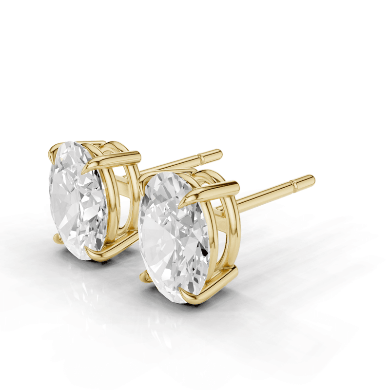 Oval Cut Diamond 4 Claw Stud Earrings
