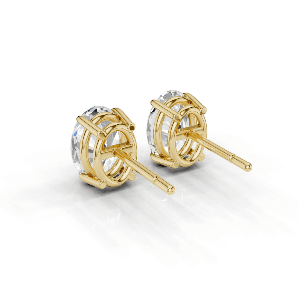 Oval Cut Diamond 4 Claw Stud Earrings