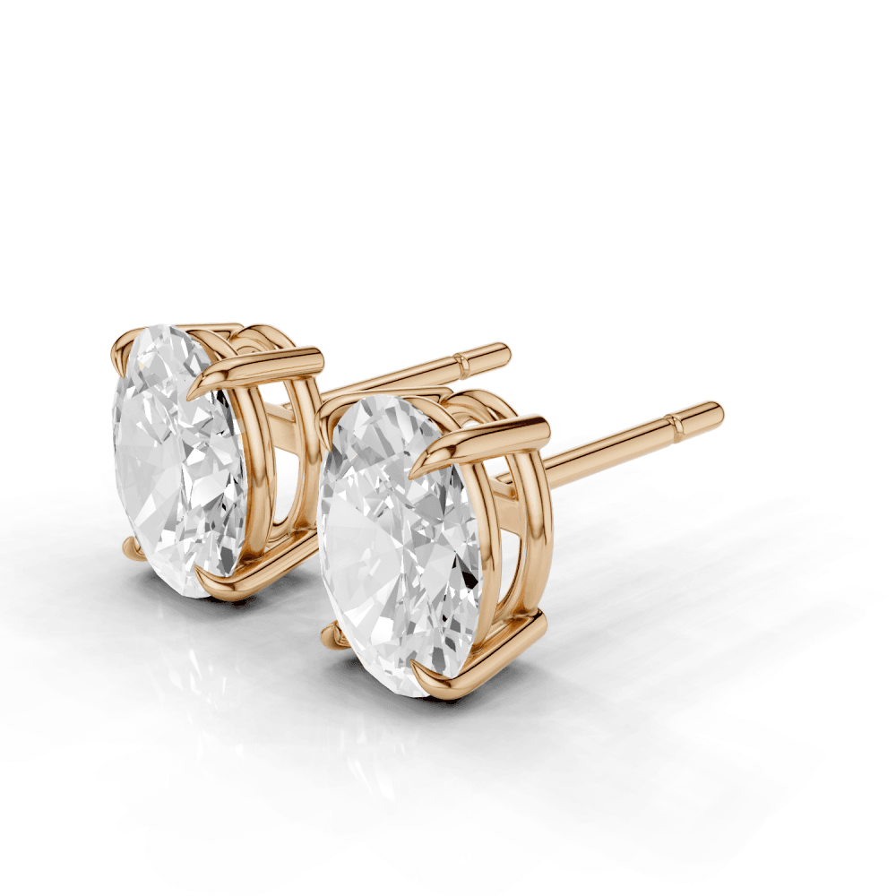 Oval Cut Diamond 4 Claw Stud Earrings