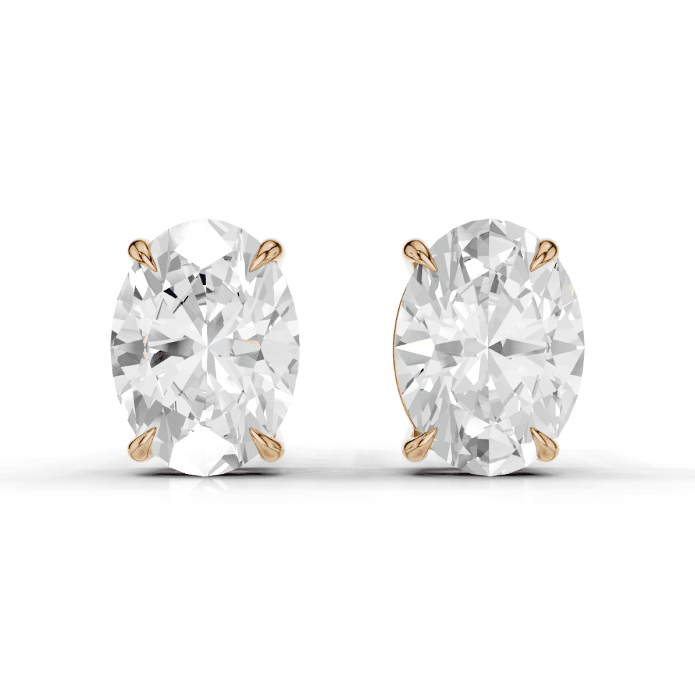 Oval Cut Diamond 4 Claw Stud Earrings