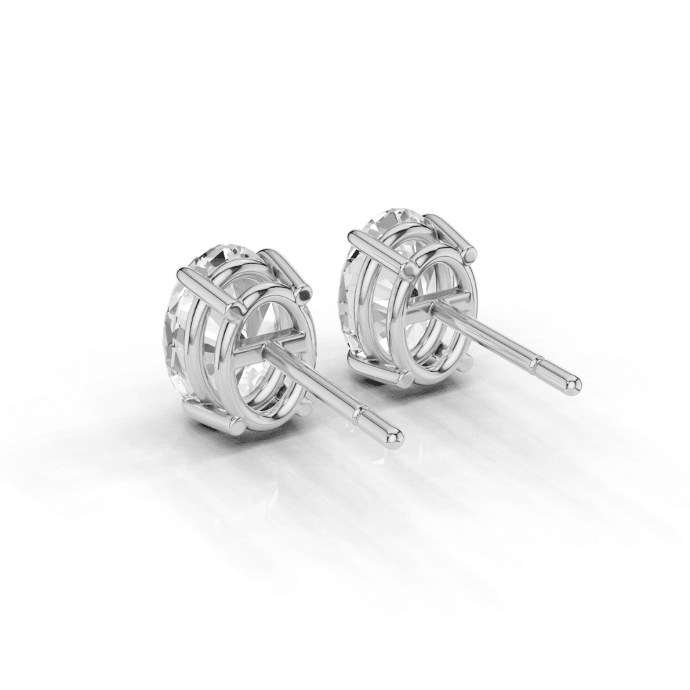 Oval Cut Diamond 4 Claw Stud Earrings