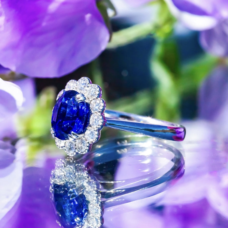 3.03ct Oval Royal Blue Sapphire & 0.55ct Diamond 18ct White Gold Cluster Ring