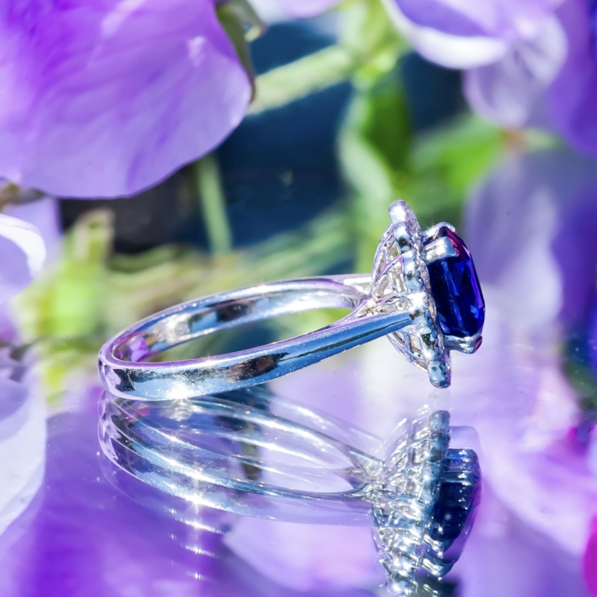 3.03ct Oval Royal Blue Sapphire & 0.55ct Diamond 18ct White Gold Cluster Ring