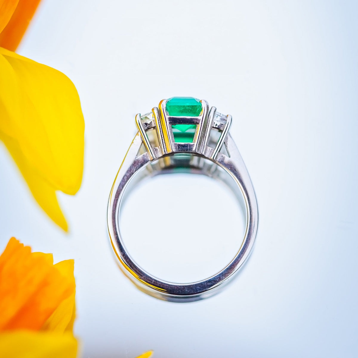18ct White Gold 1.72ct Columbian Emerald and 0.41ct Diamond Trilogy Ring