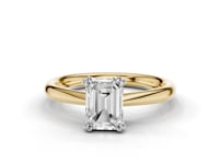 Caspia Emerald Cut Double Claw Diamond Solitaire Ring