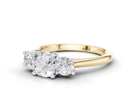 Forget-Me-Not Cushion Cut Diamond Trilogy Ring