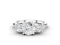 Forget-Me-Not Round Cut Diamond Trilogy Ring