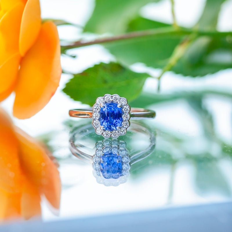 18ct White Gold 1.09ct Sapphire and Diamond Halo Ring
