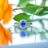 18ct White Gold 1.09ct Sapphire and Diamond Halo Ring