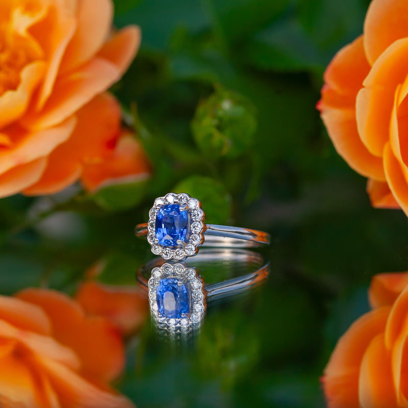18ct White Gold 1.09ct Sapphire and Diamond Halo Ring